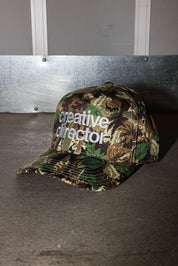 Creative Director Camo Trucker Hat