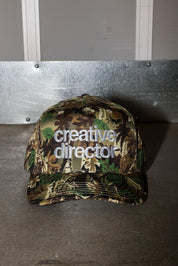 Creative Director Camo Trucker Hat