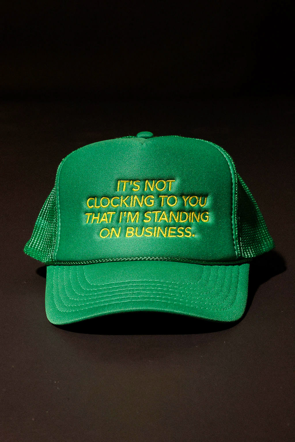 It's Not Clocking Embroidered Green Trucker Hat