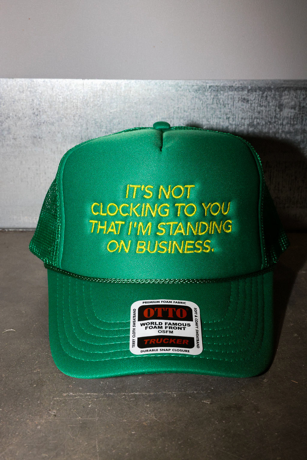 It's Not Clocking Green Embroidered Trucker Hat