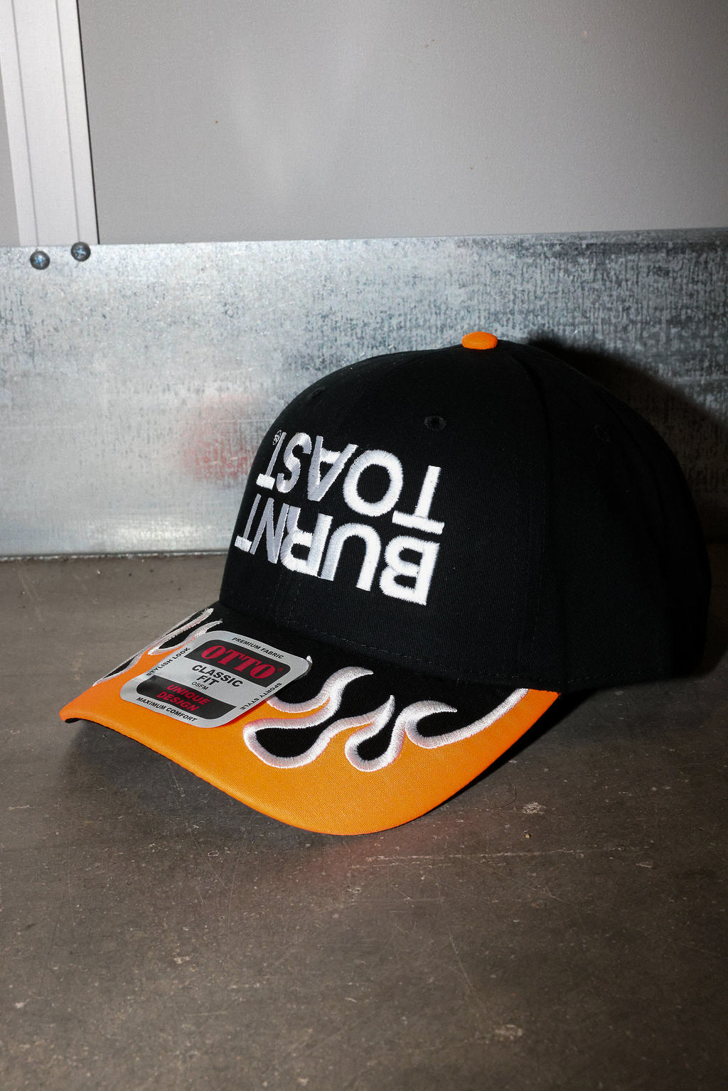 Upside Down Burnt Toast Orange Flame Embroidered Trucker Hat