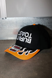 Upside Down Burnt Toast Orange Flame Embroidered Trucker Hat