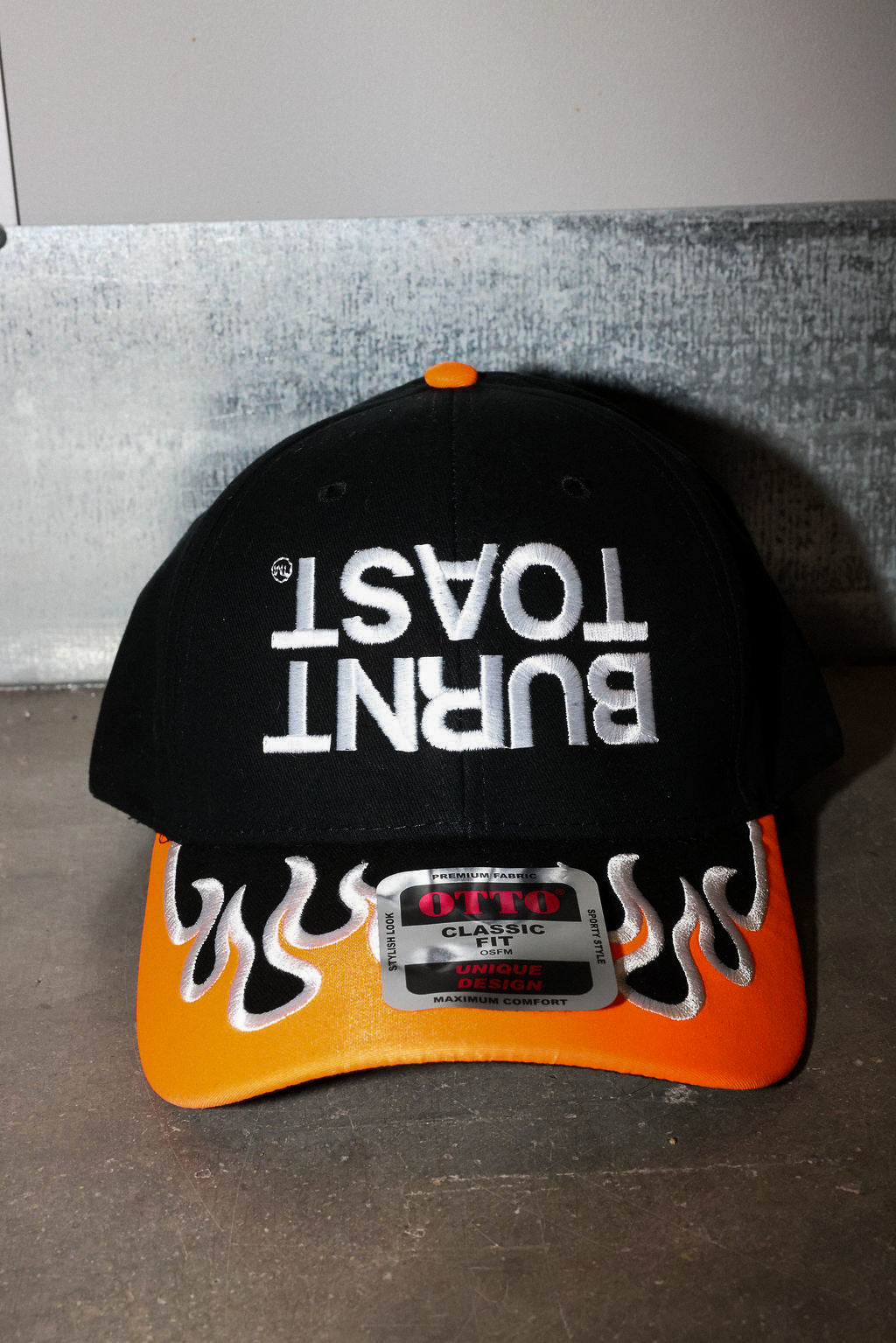 Upside Down Burnt Toast Orange Flame Embroidered Trucker Hat