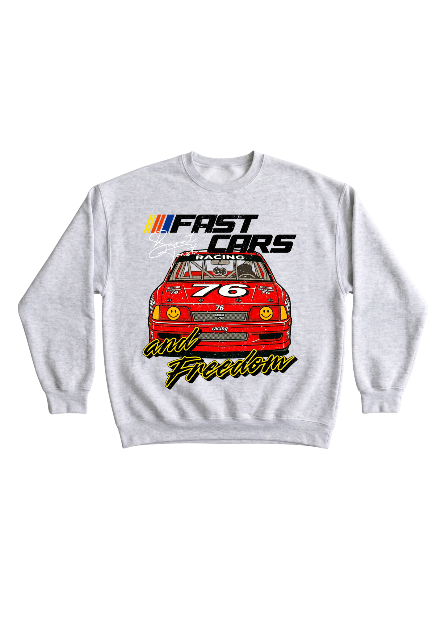 Gray crewneck with a red car graphic and 'Fast Cars and Freedom' text on a white background, flat lay frontal view