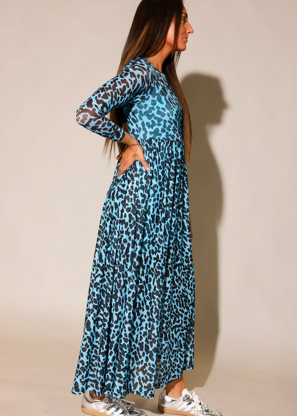 Leopard print mesh maxi dress with fitted silhouette, side view on model
