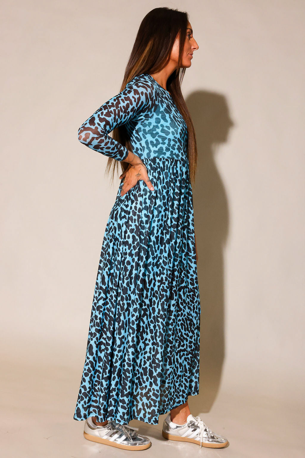 Leopard print mesh maxi dress with fitted silhouette, side view on model