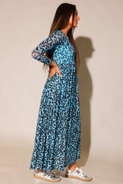 Leopard print mesh maxi dress with fitted silhouette, side view on model