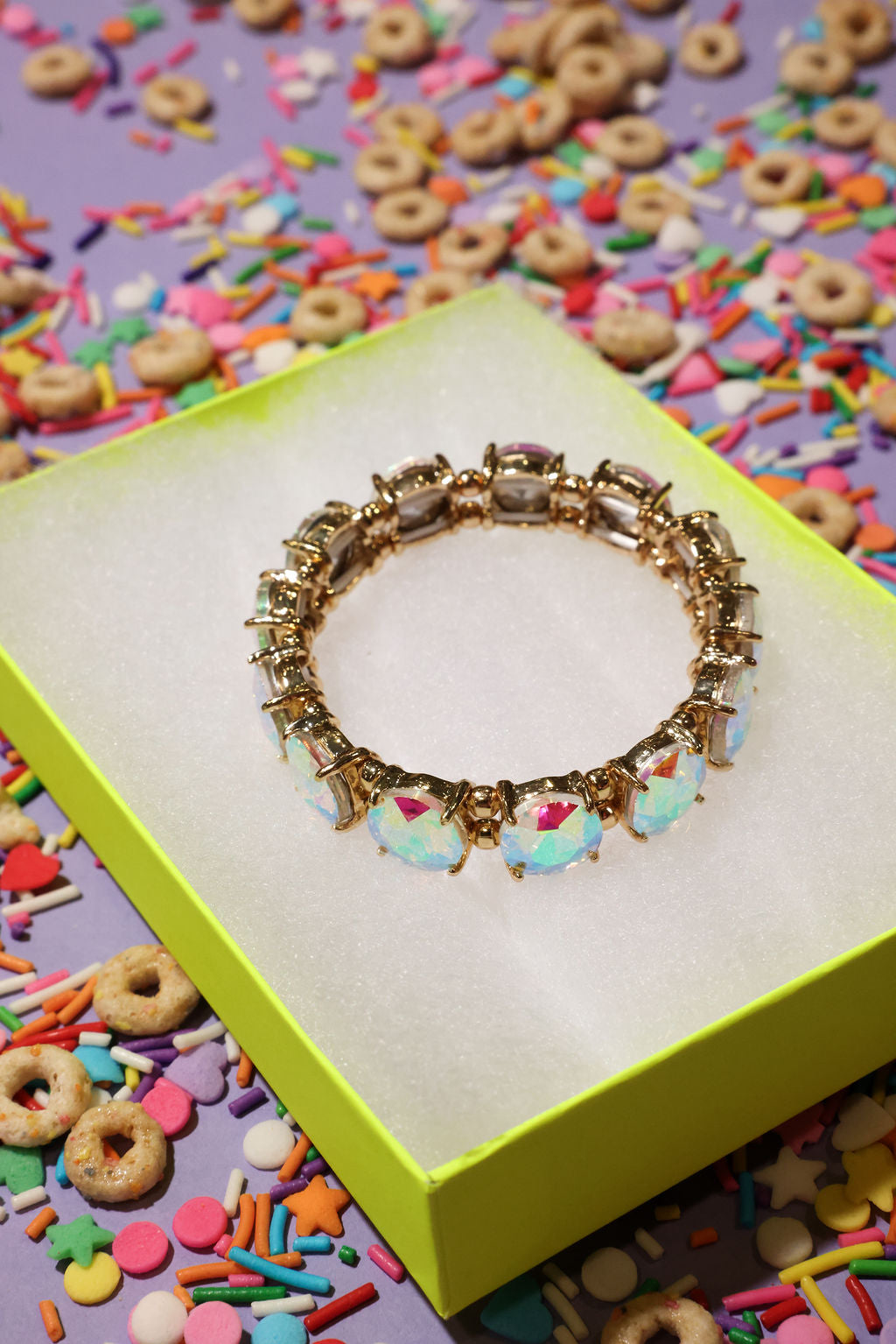 Decorative bracelet on a colorful box with cereal-themed background