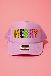 Lavender trucker hat with the text 'MERRY' in different patterns on a pink background