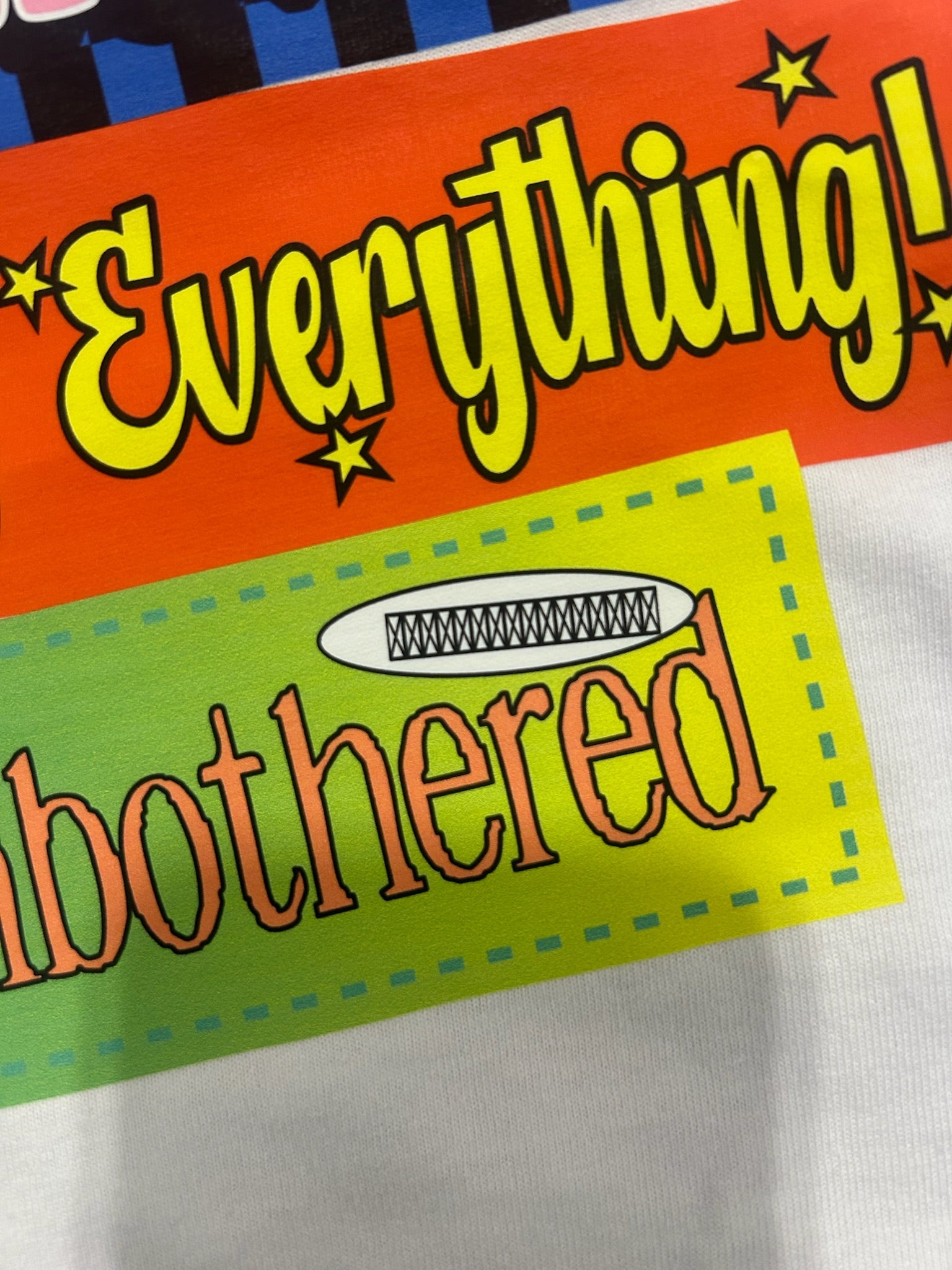 Bumper Sticker Graphic Tee *MISPRINT* (MULTIPLE SIZES) | VIP Warehouse Sale