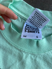 Close up of L tag