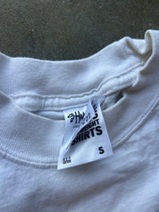 Close-up of a white crewneck t-shirt showing the inner neck label which reads 'SHADYSUNWEIGHT SHIRTS' and 'S'.