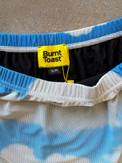 Close up of waistband featuring a s/m Burnt Toast tag