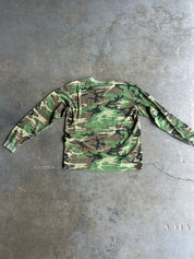 Long sleeve camo waffle tee, flat lay back view on a concrete surface