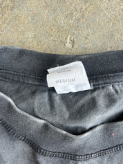 Close up of collar and MEDIUM tag