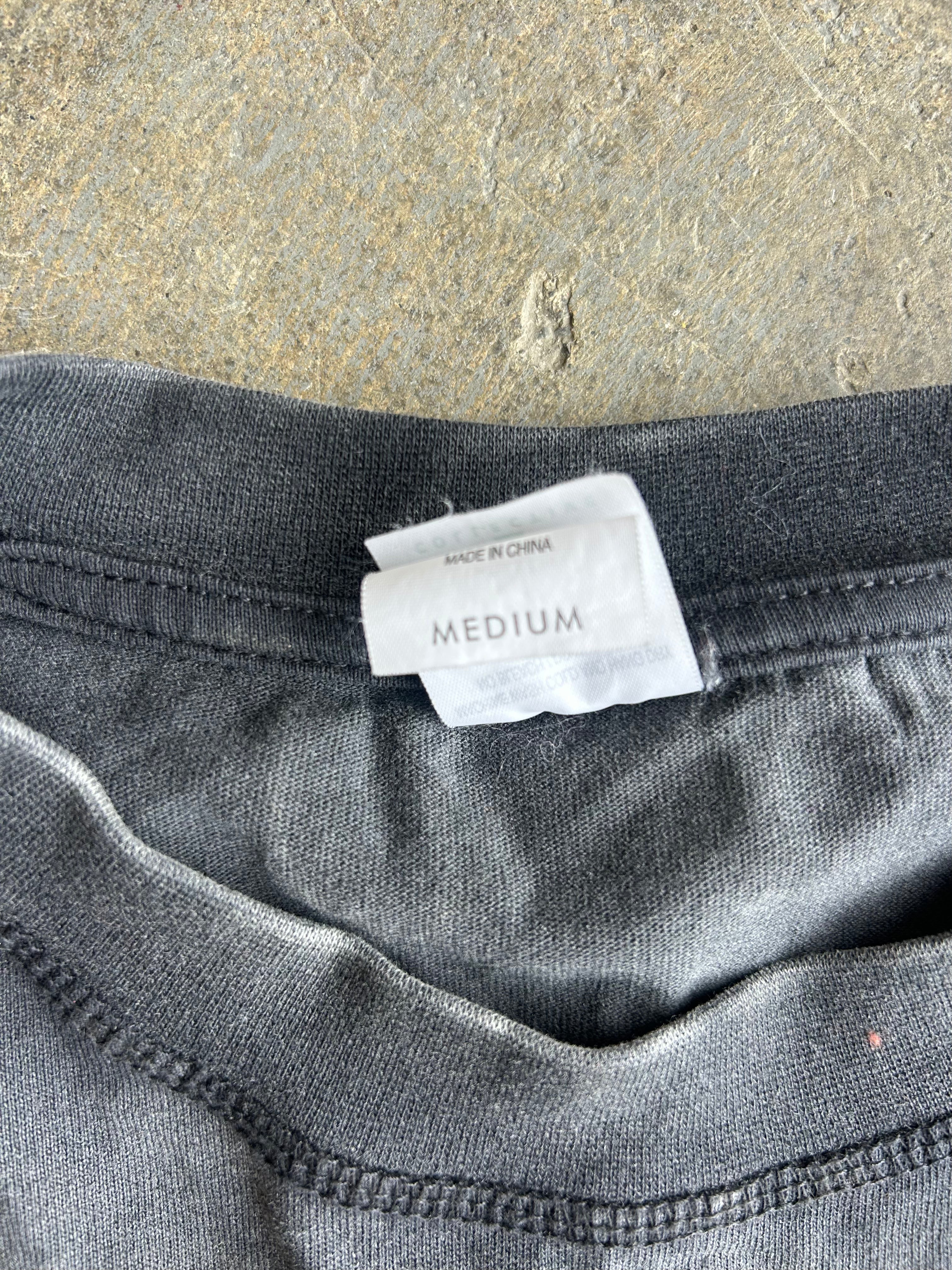 Close up of collar and MEDIUM tag
