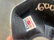 Inside of a hat with a Coors Tag