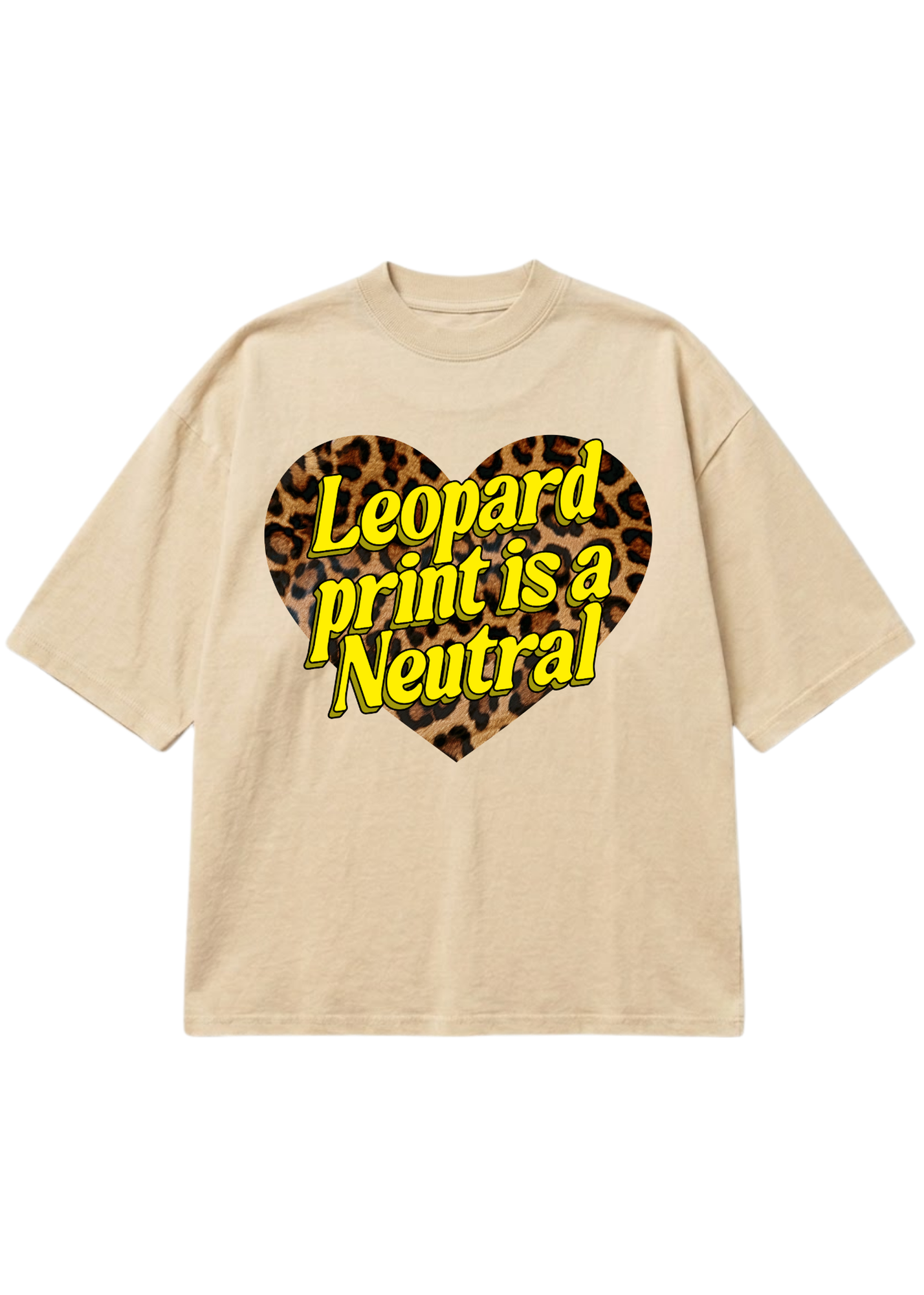 A beige short-sleeve t-shirt with a graphic on the chest featuring a leopard print heart and the text 'Leopard print is a Neutral' in yellow with black outlines