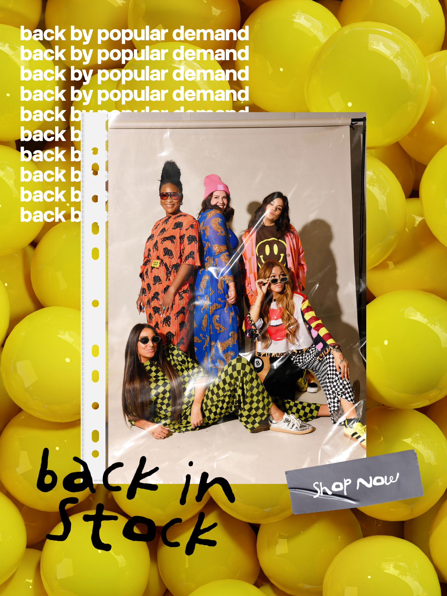 A vibrant back in stock banner featuring a group of women styled in bold, colorful prints including leopard, checker, zebra, and flame patterns. Photos are displayed in a polaroid grid and film strip layout against a yellow bubble background with repeating "back by popular demand" text.
