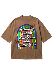 Brown t-shirt with rainbow and butterfly graphic and text on a white background, flat lay frontal view