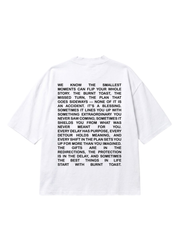 A white short-sleeve t-shirt with a black printed quote on the front, displayed flat against a solid white background