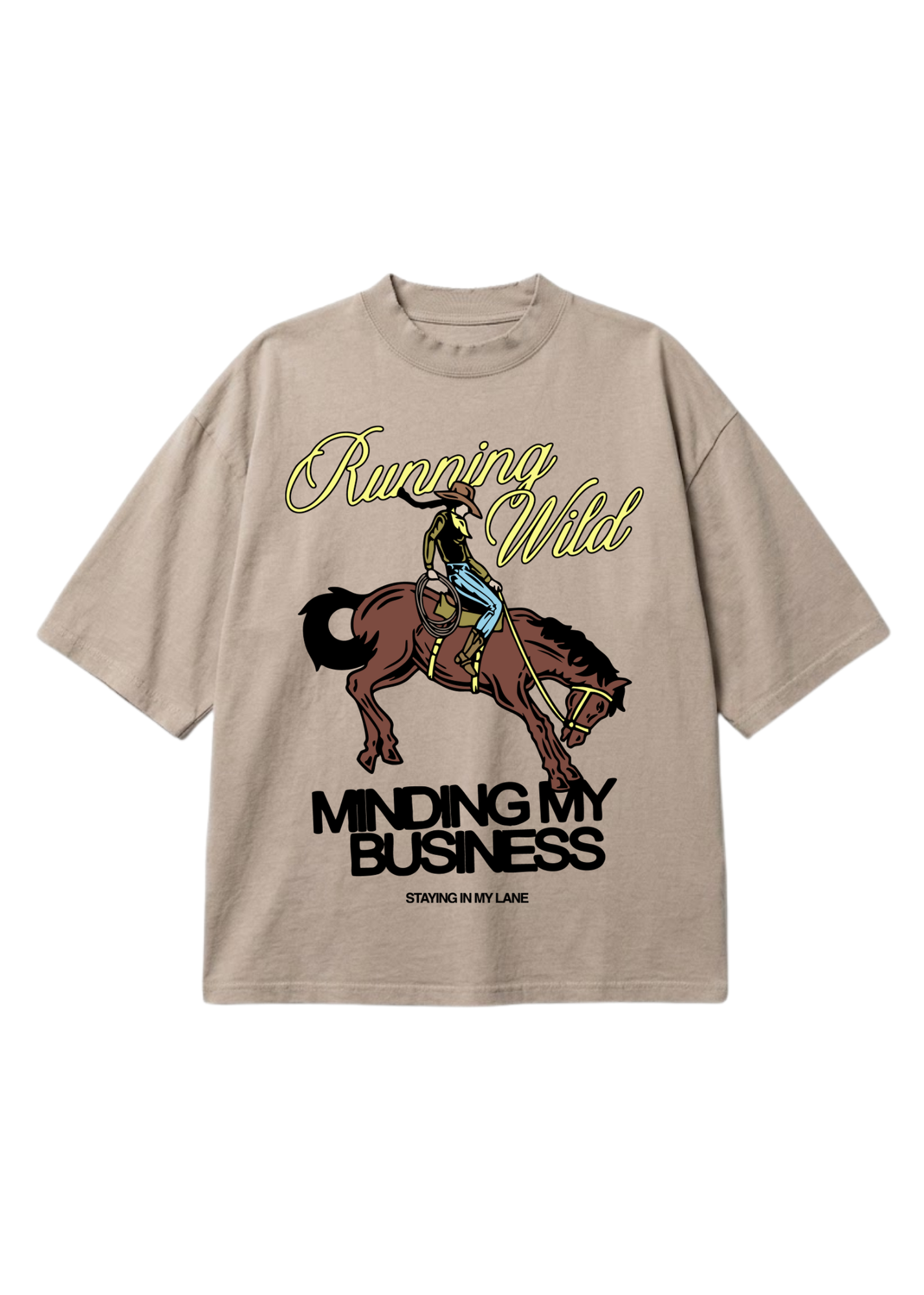 A beige graphic t-shirt featuring a cowboy riding a bucking horse, with the text 'Running Wild' in yellow script and 'MINDING MY BUSINESS' in black block letters. The brand 'STAYING IN MY LANE' is printed at the bottom of the graphic