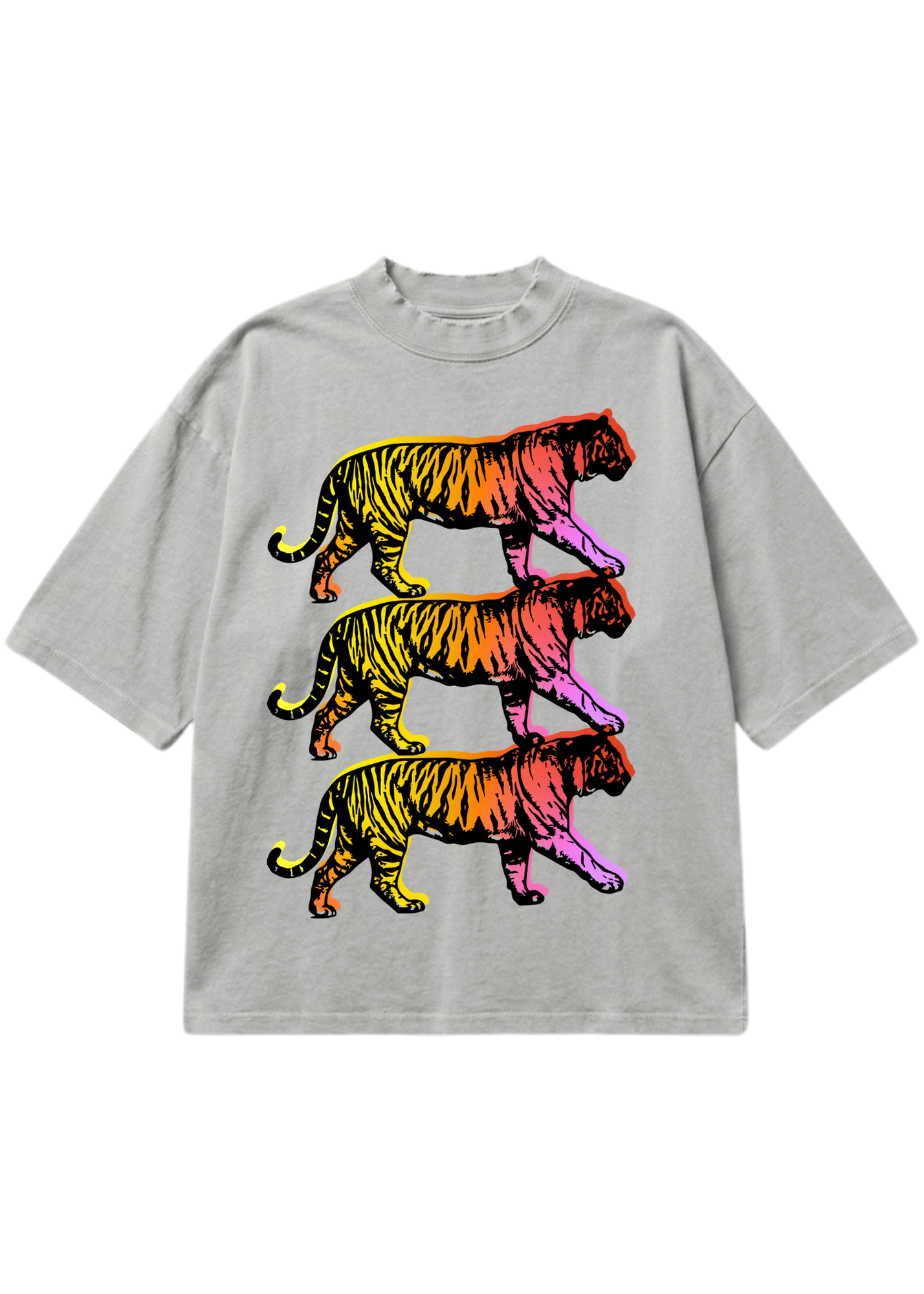 A light gray oversized short-sleeve t-shirt featuring a graphic print of three stacked walking tigers in a vibrant rainbow gradient of yellow, orange, red, pink, and purple, displayed flat against a solid white background