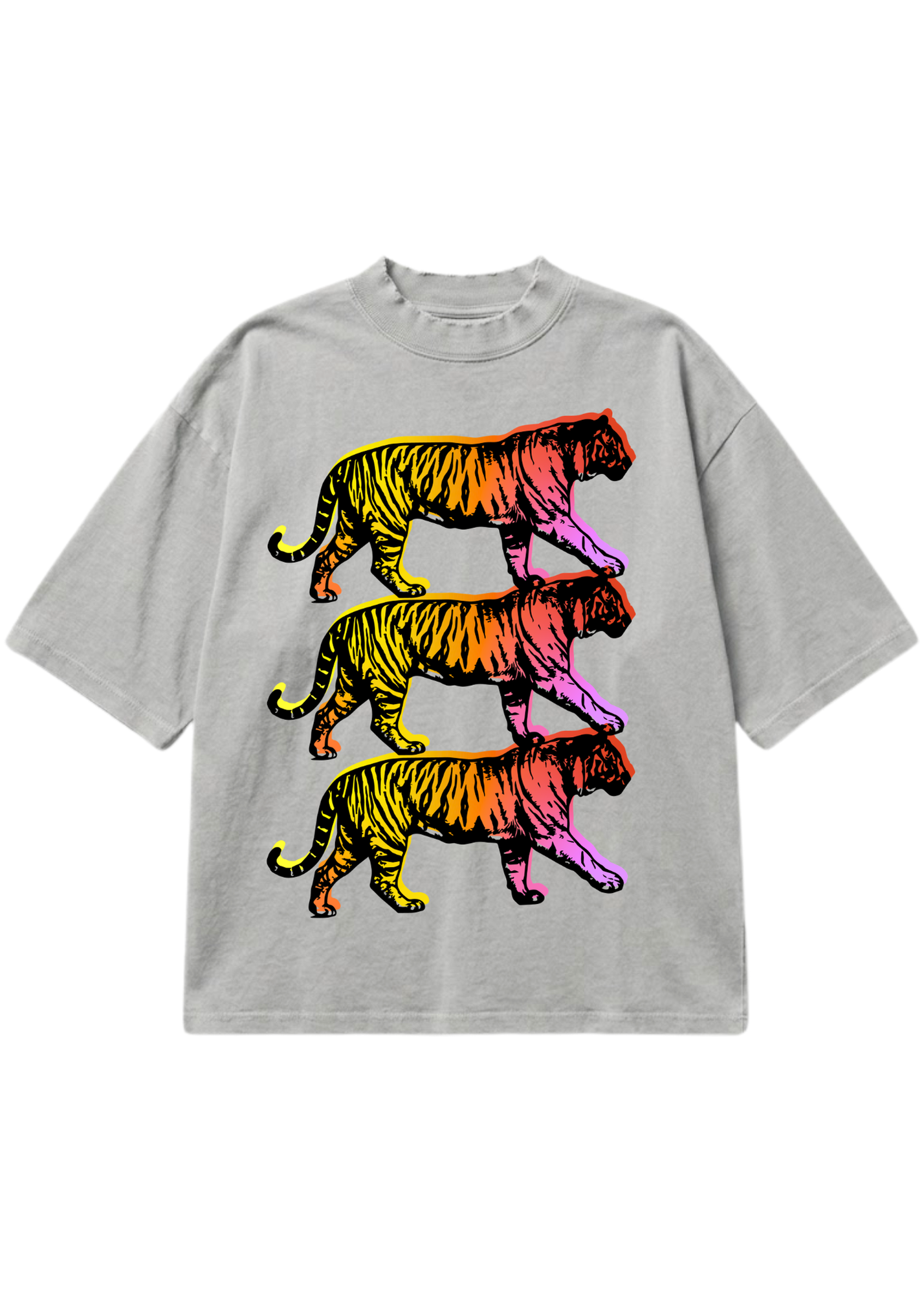 A light gray oversized short-sleeve t-shirt featuring a graphic print of three stacked walking tigers in a vibrant rainbow gradient of yellow, orange, red, pink, and purple, displayed flat against a solid white background