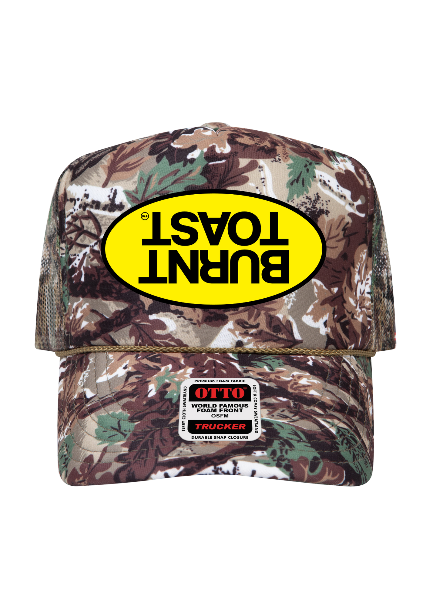 A camouflage trucker hat with a large yellow 'BURNT TOAST' logo patch on the front and a visible Ottomah brand patch on the brim, set against a plain white background.