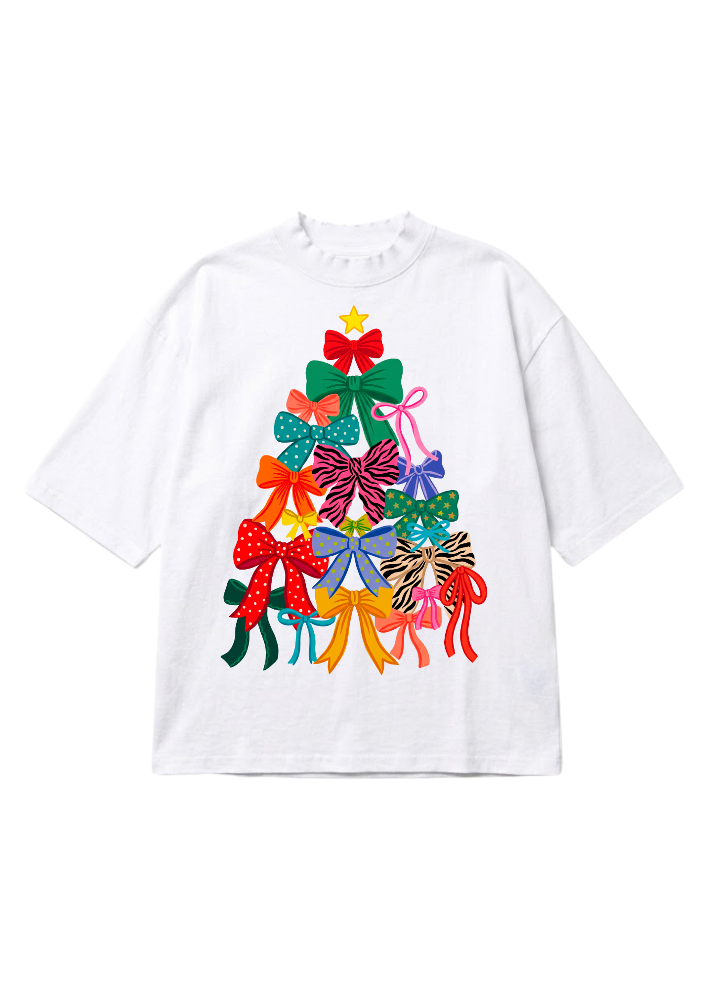 A white oversized graphic tee featuring a Christmas tree made entirely of colorful patterned bows in various styles — polka dot, zebra, solid, and star print — topped with a gold star. Flat lay on white background