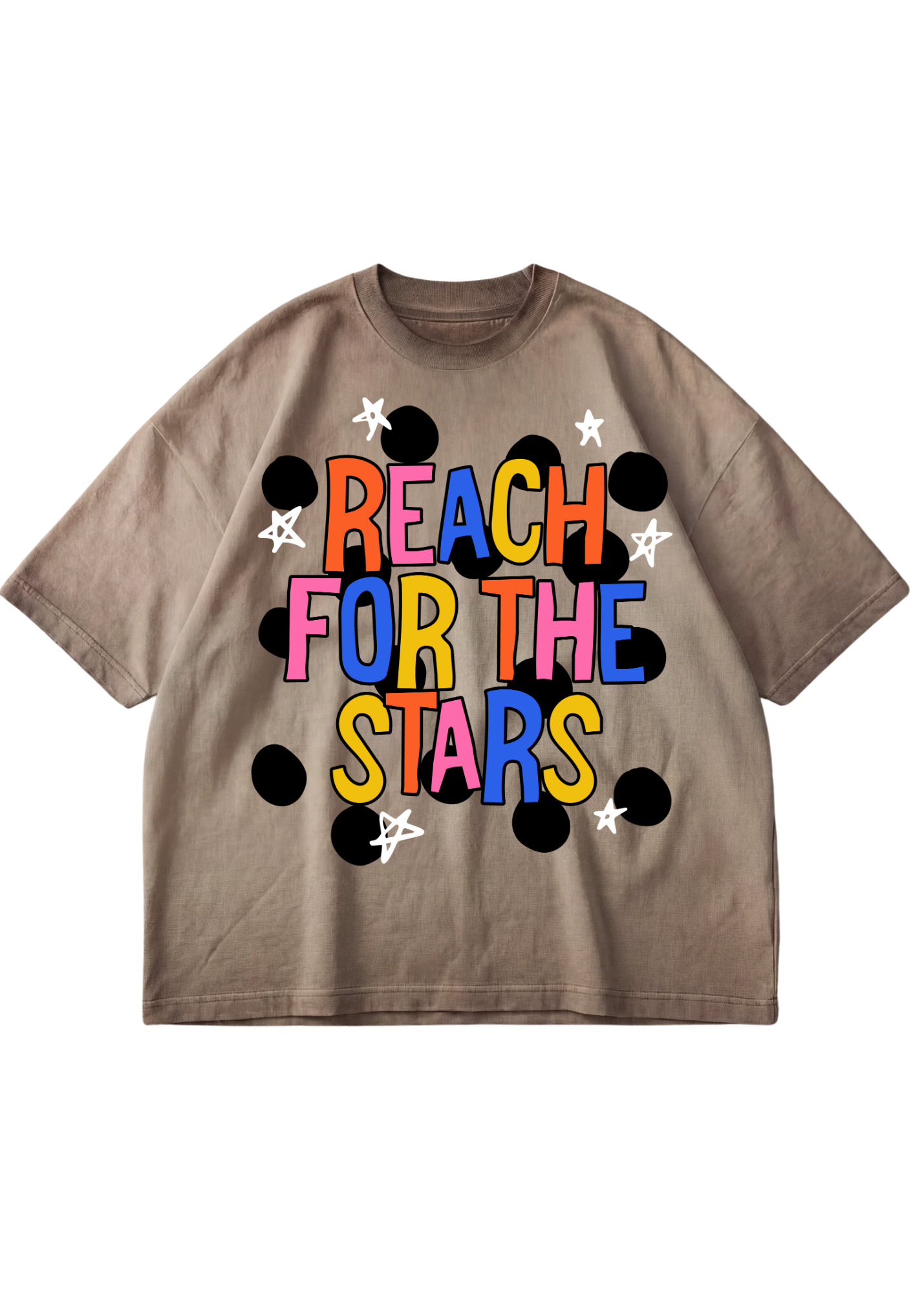 A taupe brown short-sleeve t-shirt with a colorful graphic on the front reading 'REACH FOR THE STARS' in multicolored letters, surrounded by black polka dots and white stars