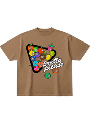 A brown short-sleeve t-shirt with a graphic on the front showing a pool billiard triangle filled with colorful fruit and billiard balls, with the text 'pretty please' in white script, flat lay frontal view