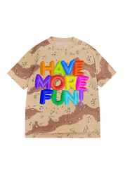 A light camo tee with the text 'HAVE MORE FUN!' in mulit-colored balloon letters on a white background