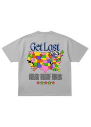 Gray t-shirt with a colorful map of the United States and 'Get Lost Tour' text on a white background, flat lay back view