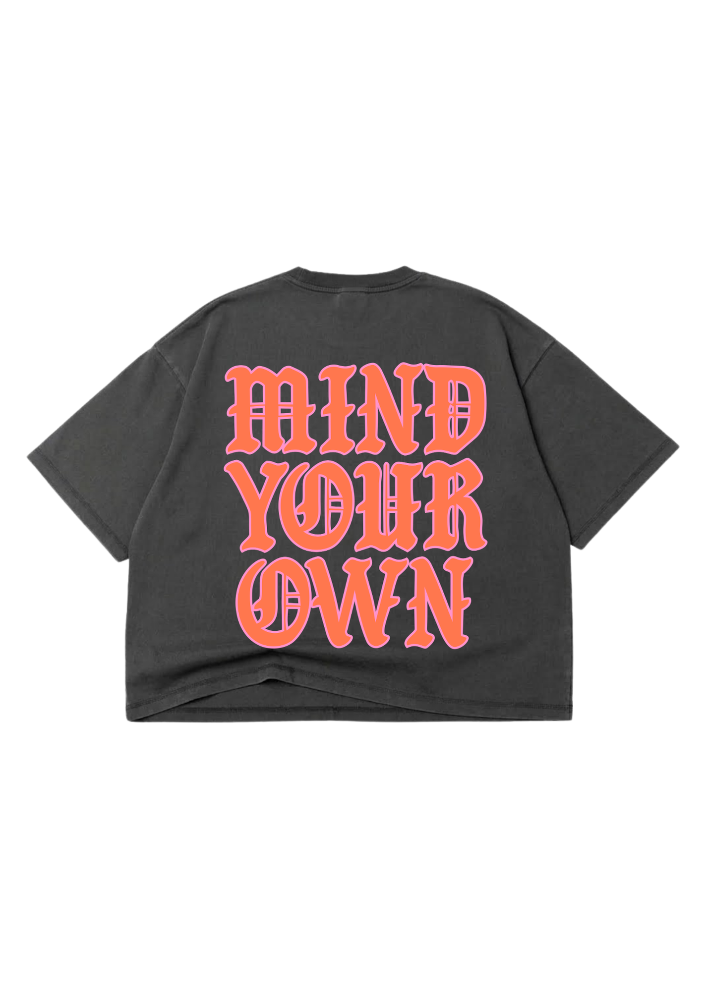 The back of a grey cropped tee with pink text that reads 'MIND YOUR OWN' on a white background